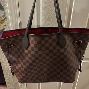 Louis Vuitton authentic. Purchased last year only used few times .
